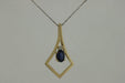 Blue Sapphire and White Diamond Pendant (0.67 CT) in 14k Yellow Gold 