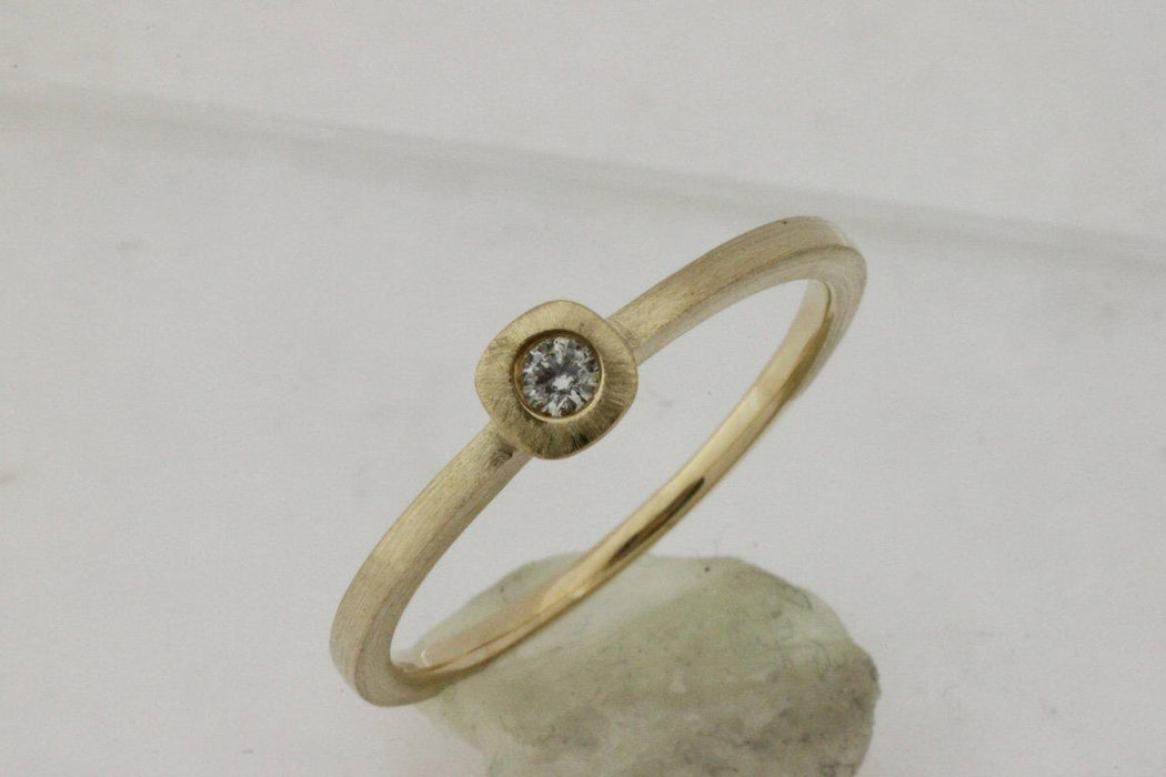 White Diamond Ring (0.06 CT) in 14K Yellow Gold